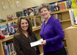 Mayfield Elementary Principal Traci Chouinard (left) poses with Ashley White, Executive Director of the Lapeer County Community Foundation.