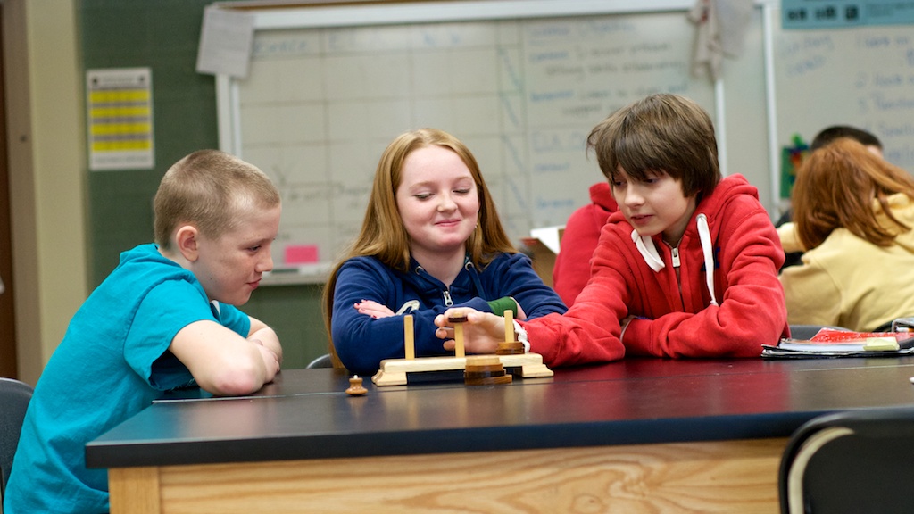 Students in Jaime Benson's science class at Zemmer Middle School hone problem-solving skills using locally-made brain teaser puzzles.